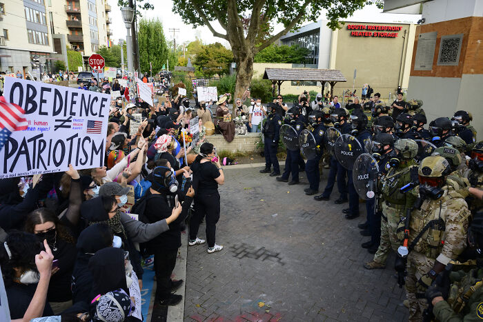 Video Shows DHS Snipers Allegedly Aiming Lasers At Antifa Member Threatening Reporter In Portland