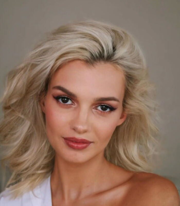 Close-up portrait of a woman with blonde hair, representing the story of GoFundMe pulling fundraising pages.