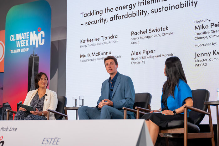 Panel discussion on tackling energy challenges with experts, highlighting solar power plant boom in Africa and sustainable solutions.