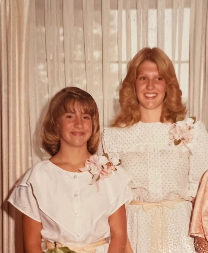 Two young girls in vintage dresses with floral corsages, unrelated to Texas megachurch pastor Robert Morris child sex abuse case.