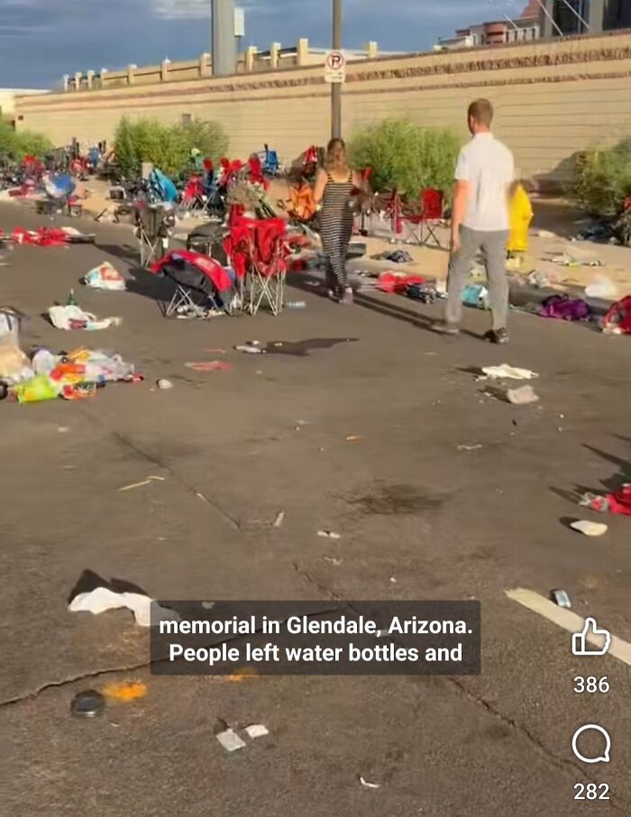 People walking through trash and chairs left after a Trump rally mess on a street in Glendale, Arizona.