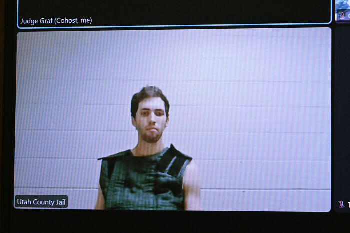 Man appearing in Utah County Jail video call, related to legal case involving gag order and controversy keywords.