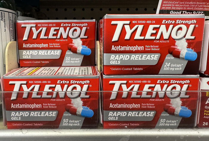 Boxes of Extra Strength Tylenol acetaminophen rapid release gels on a retail store shelf related to circumcision autism claim.