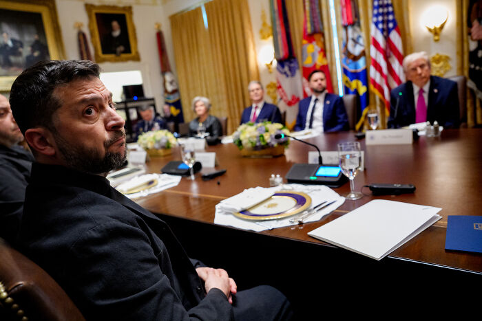 Volodymyr Zelenskyy at a meeting with Donald Trump and officials, highlighting Trump's latest private shouting match with Zelenskyy.
