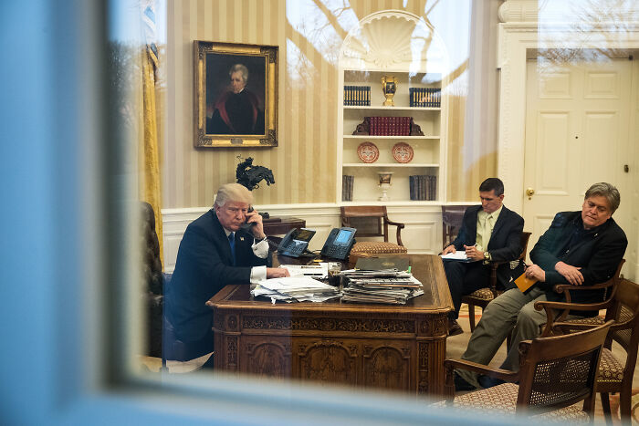 Steve Bannon and associates in a White House office discussing strategy for a potential third Trump term.