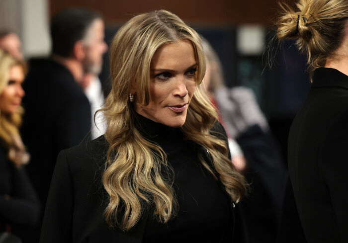 Megyn Kelly in a black outfit at an event, discussing Epstein claim related to child predator allegations.