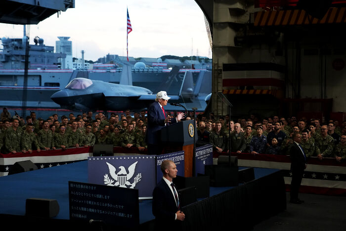 Former President Trump speaking to military personnel on a naval ship during a late-night rant about Seth Meyers.