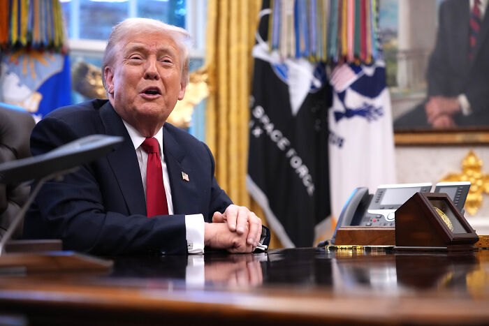 Former President seated at the desk in the Oval Office, related to Zohran Mamdani's White House observation.