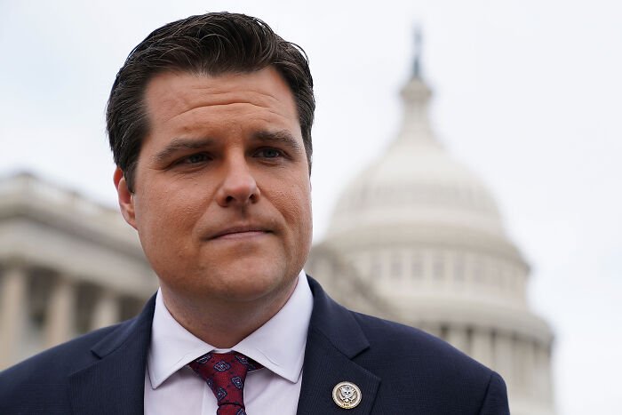 Matt Gaetz standing near the Capitol building, involved in a probe concerning a teen and adult work payments.