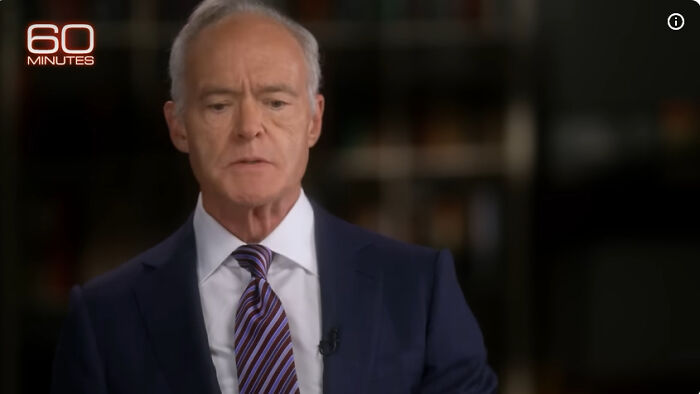 60 Minutes host in a suit and tie speaking during a recorded interview about on-camera guest struggles and fear of retribution.