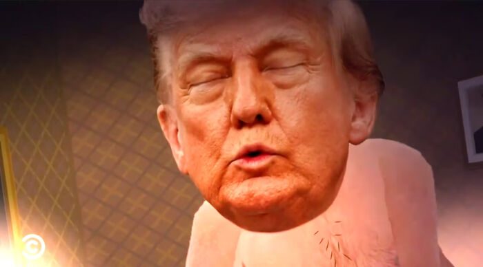 Animated scene from South Park featuring a large-headed Trump character in an intimate, shocking moment.