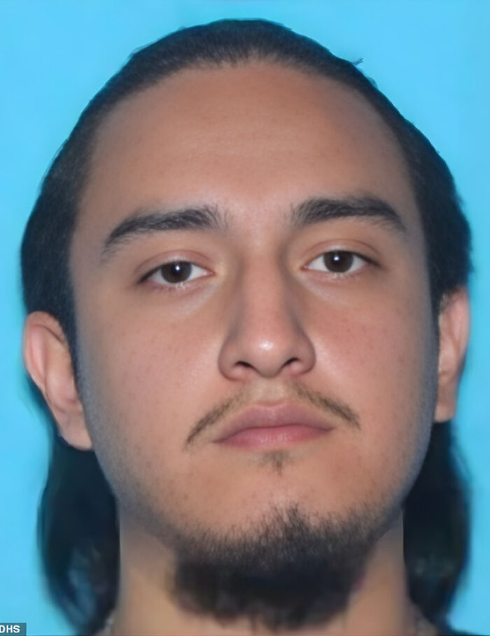 Mugshot of a man linked to federal agent shooting of Chicago woman with multiple wounds, attorney reports.