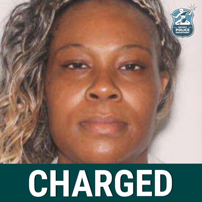 Mugshot of a woman with wavy hair, Detroit Police Department logo, with bold text charged related to crimes shocking the nation.