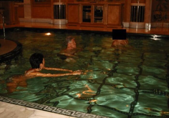 Image showing a vintage indoor pool scene related to Trump, Clinton, and Epstein photo dump discussion.
