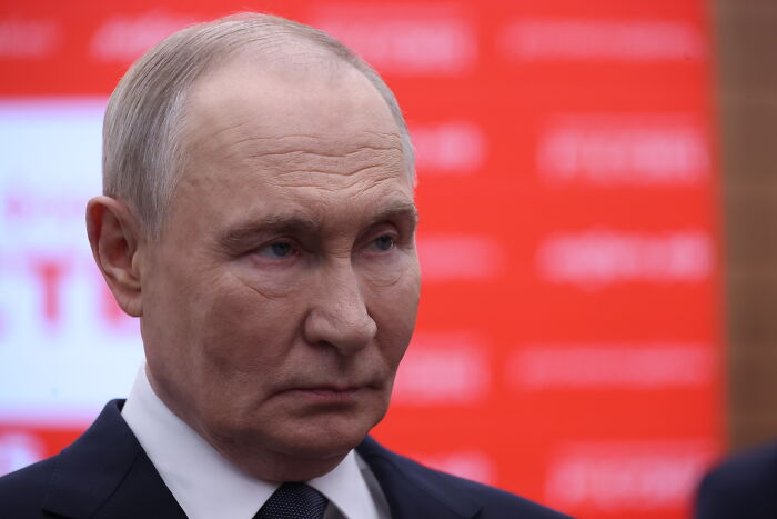 Close-up of a serious man in a suit, relevant to Trump being told to provide medical records in Pulitzer lawsuit.