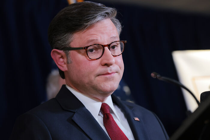 House Speaker Mike Johnson speaking at a press conference amid MAGA women revolt over his decision to stay in power.
