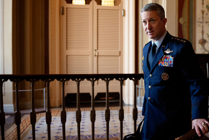 Senior military officer in uniform indoors, with Trump&rsquo;s war crimes in the Caribbean a focus of expert criticism.