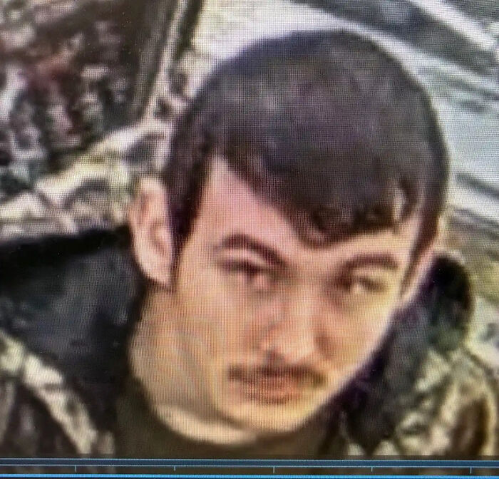 Teen arrested after attack on parents, mother fatally injured, siblings inside home, young male with short dark hair in a jacket.