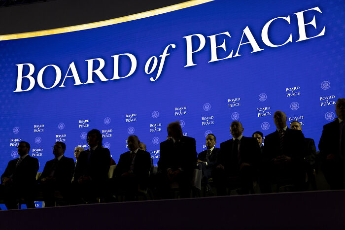 Group of world leaders seated in front of a large Board of Peace sign amid tension after Trump&rsquo;s unhinged tirade.