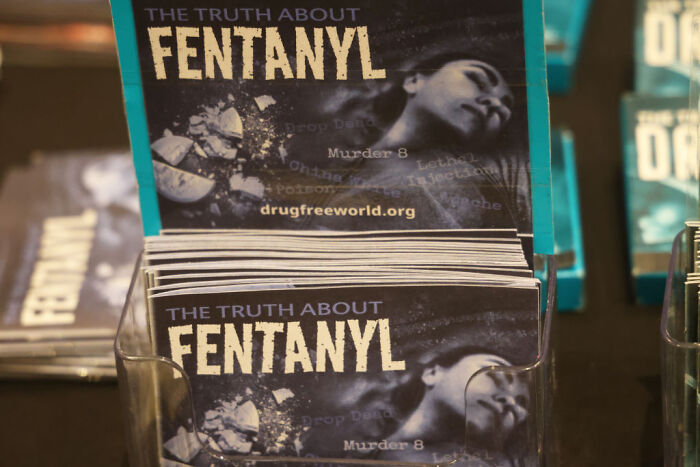 Pamphlets titled The Truth About Fentanyl displayed in a clear holder, highlighting d**g awareness information.