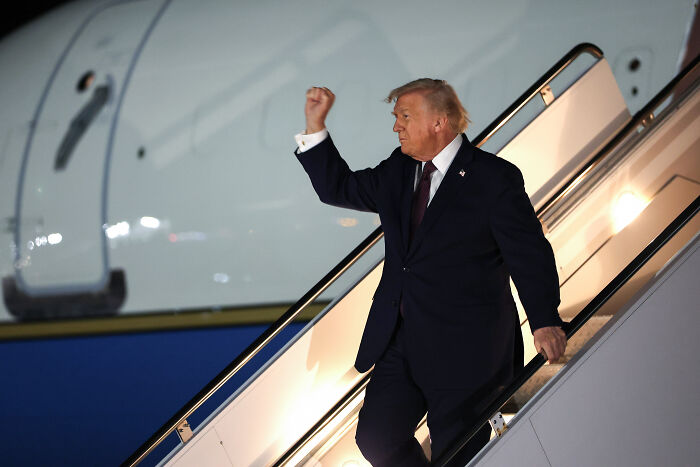 Trump, 79, Struggles To Descend Air Force One Stairs After Surprise Health Disclosure