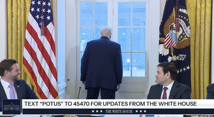 Former President Trump distracted and staring out a window in the White House sparking viral meme reactions.