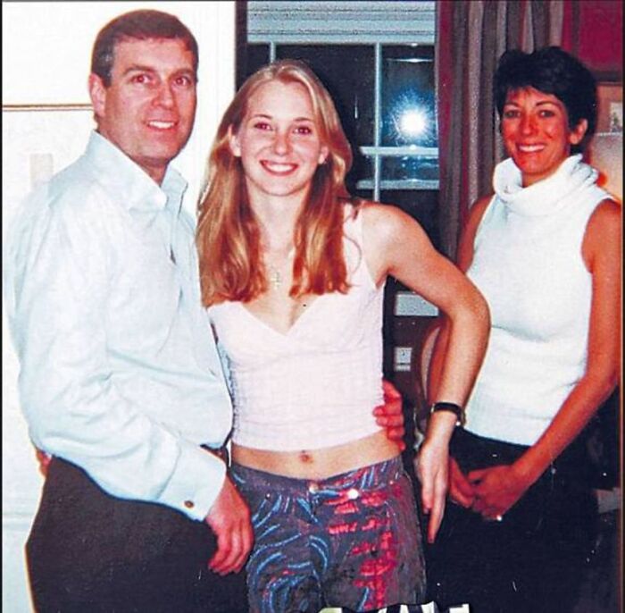 Prince Andrew posing with two young women indoors, related to King Charles and Andrew Epstein scandal reputation issues.