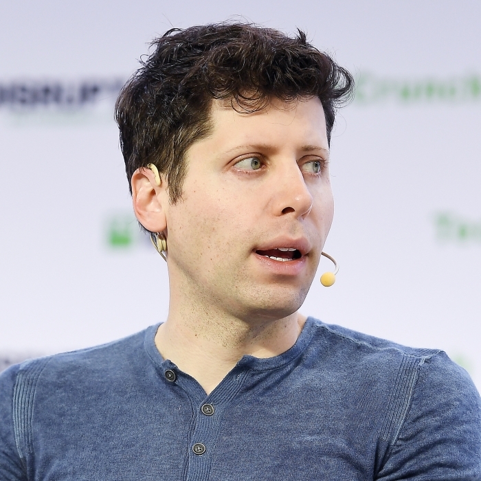 Sam Altman discussing AI technology at event Sam Altman discussing AI technology at event