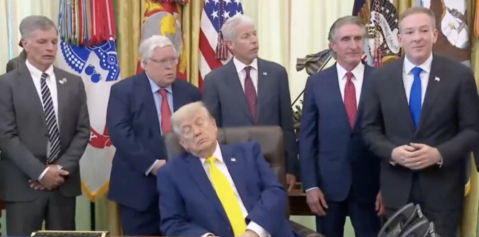 Drowsy Donald Trump tilting to one side while standing with officials at White House