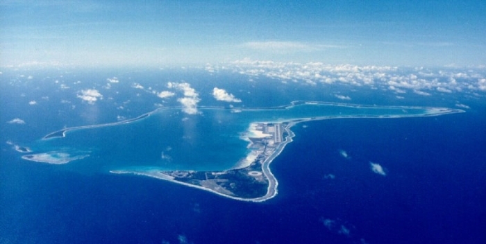 Aerial view of an Indian Ocean atoll illustrating island shape
