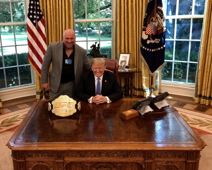 Donald Trump and Dana White in Oval Office with UFC belt on desk
