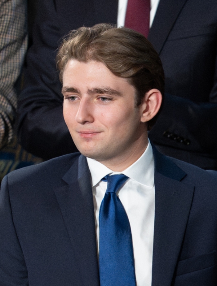 Barron Trump attending State of the Union address in 2026 wearing navy suit Barron Trump attending State of the Union address in 2026 wearing navy suit