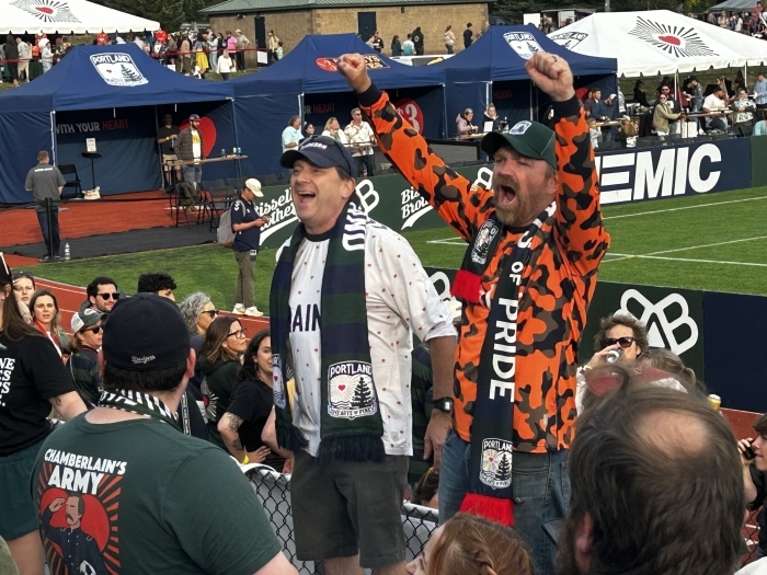 Troy Jackson and Graham Platner cheering at Portland Hearts of Pine soccer match