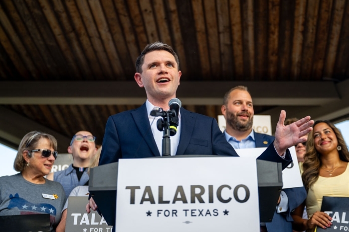 James Talarico speaking at a campaign event with supporters in Texas